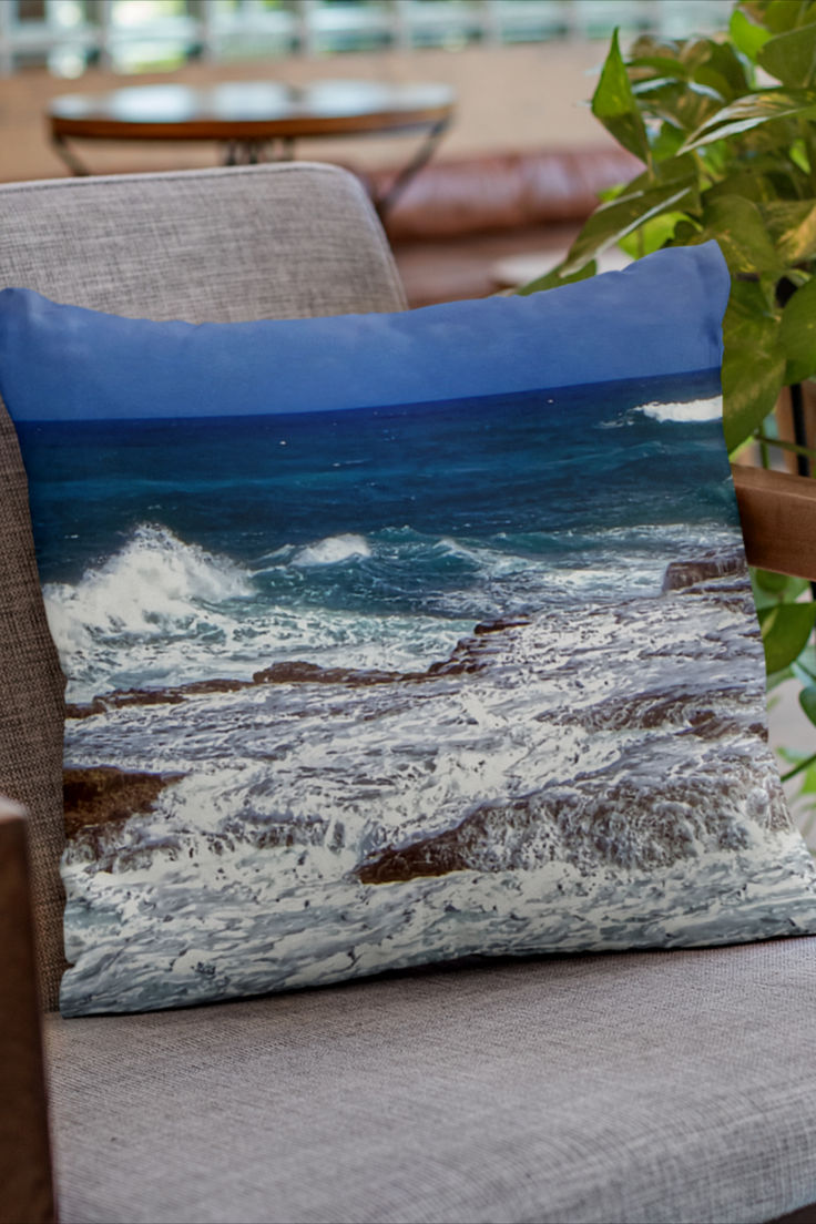 Waves crashing on rocks in Barbados art on pillow